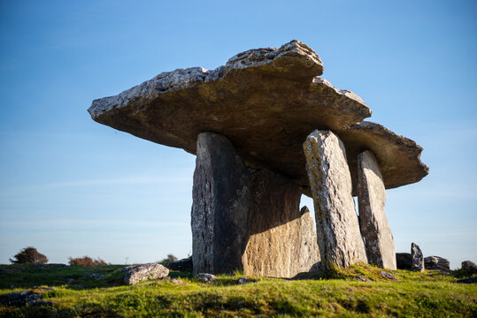 The burren and Poulnabrone Dolmen against sky