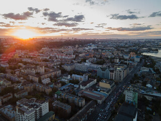 Aerial view of the big city at sunset