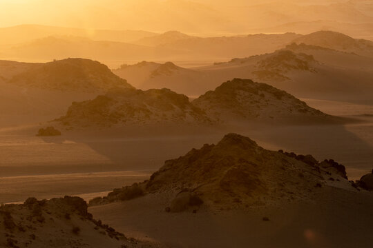 View of sand dunes in Skeleton Coast National Park during sunset