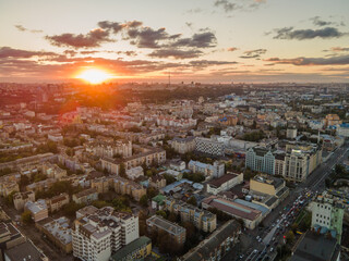 Aerial view of the big city at sunset