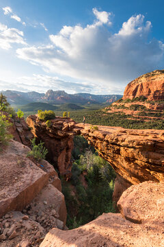 View of man looking at view while standing on Devil's Bridge