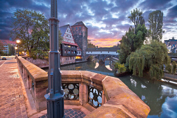 Nurnberg. Pegnitz river weaterfront Weinstadel and Henkersteg in Nuremberg dawn view © xbrchx