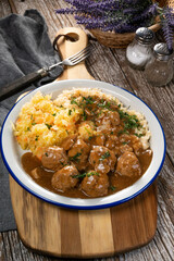 Minced meat balls in mushroom sauce.