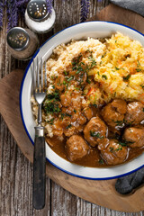 Minced meat balls in mushroom sauce.