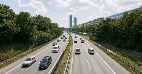 View of a modern motor road with cars in the city of Munich