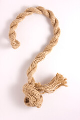 close up brown strong rope, question mark, isolated