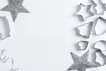Obraz premium Decorative metal cookie cutters for Christmas pastry.