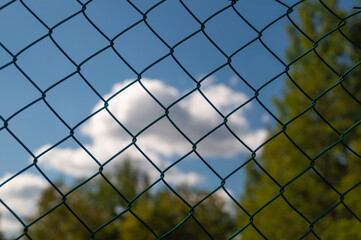 Fence. Grid on natural sky background