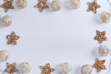 Greeting Christmas frame from light garland and craft stars.
