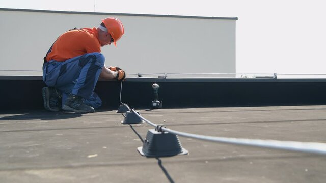 Assembling Roof Lightning Protection System Rods by Lightning Protection Specialist.