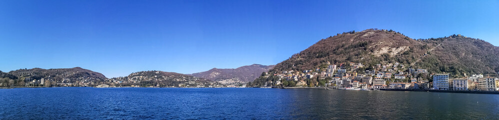 Fototapeta na wymiar ultra wide panorama of the Lake Maggiore and Laveno