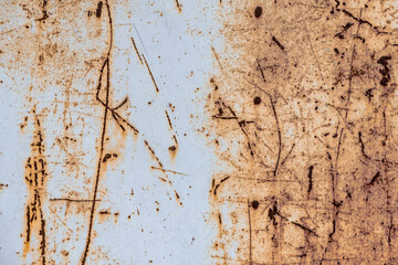 Interesting painted old metal surface with traces of rust, scratches and time damage texture
