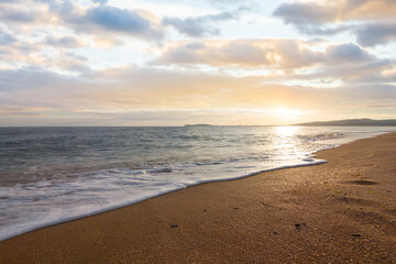 sandy sea beach at the sunset, outdoor summer vacation natural background