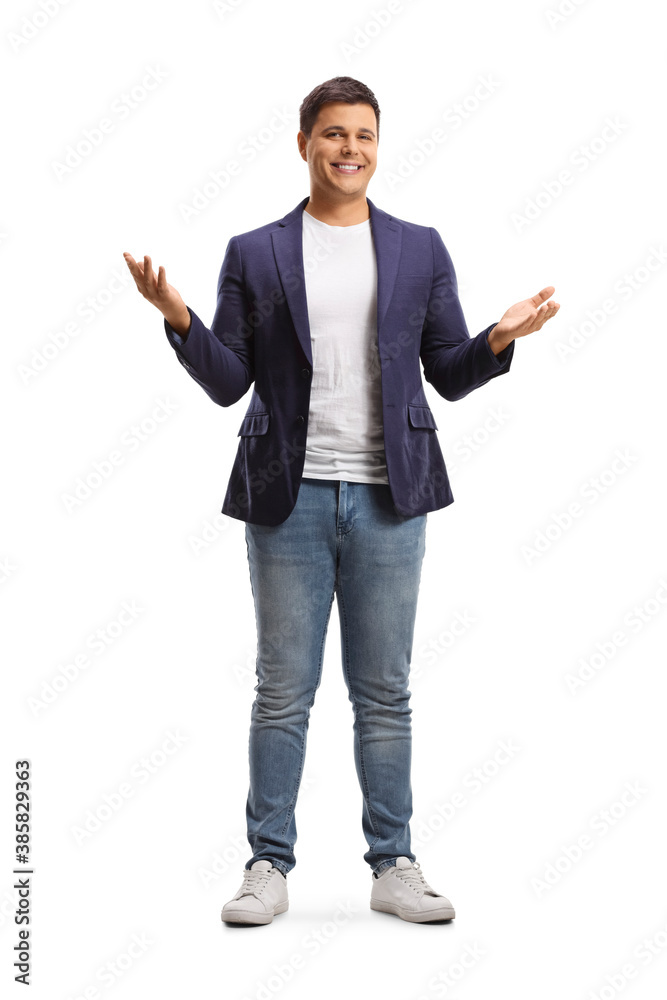 Canvas Prints Full length portrait of a happy young man in jeans and suit gesturing with hands