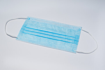 Medical protective face mask isolated on white background