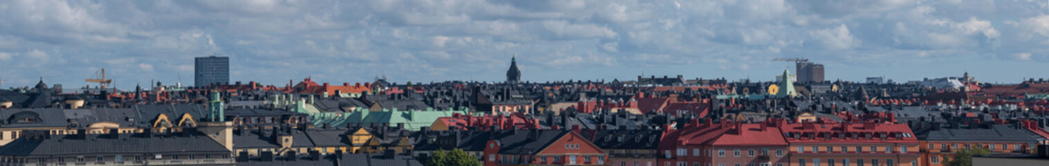Fototapeta premium Skyline over roofs of the district Vasa Stan in Stockholm a sunny morning.