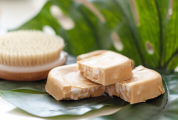 handmade soap made from squeezing soap slivers and brush, the concept of spa and self-care at home