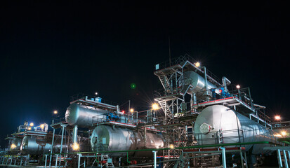 Industrial equipment at an oil refinery station.
Oil and gas industry, oil refining and refining