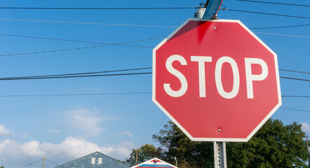 stop sign on blue sky