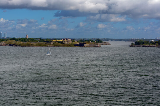 View from cruise ferry heading to Helsinki and approaching the Suomenlinna (fin. Castle of Finland) fortress (Sveaborg - Castle of the Swedes, swed), Finland. It consists of eight islands.