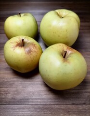 apples on a wooden table