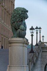 Symbolik lion at the sloop Lejonbacken at the royal castle in the old town district Gamla Stan in Stockholm an early morning