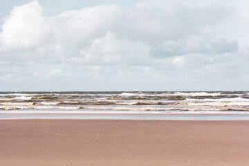 Fototapeta na wymiar Leichte Wellen am Strand