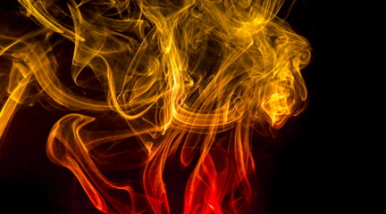Colored smoke on black background