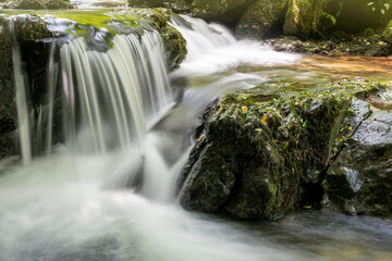 Long exposure of a waterfall on the Hoar Oak Water river at Watersmeet in Exmoor National Park