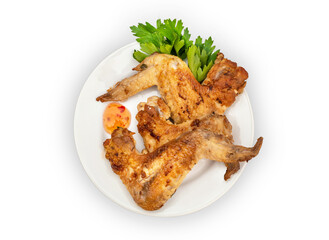 Plate with smoked chicken wings on white background.
