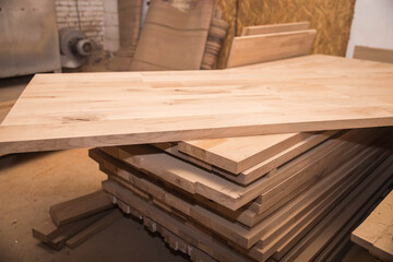 Oak wood panels from which tables will be made