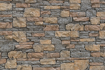 Fragment of a wall tiled with masonry tiles. Background. Texture.