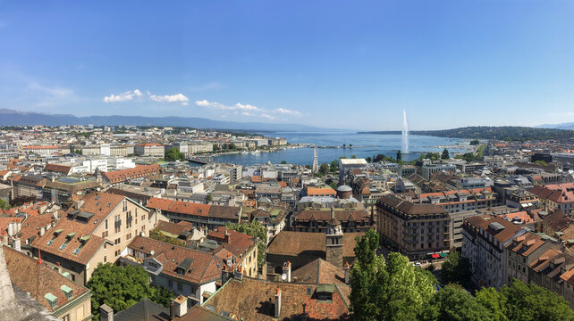 Panoramic view of swiss city of Geneva and its lake with water jet