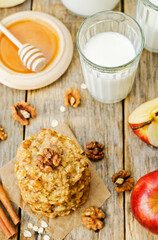 apples oats cinnamon cookies on a wood background