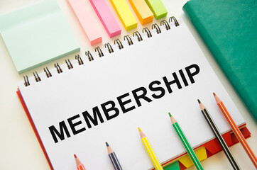 the word membership is written in a notebook with graphs next to pencils. Member Login Membership Login Password Concept