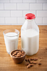 almond milk image on wooden background