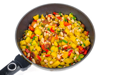 Frying pan with vegetable stew with pumpkin and white beans