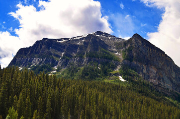 Alberta, Canada - Mountain above Forest by Lake Louise