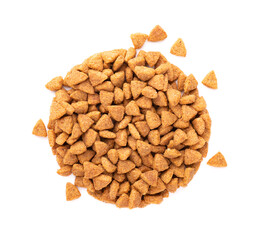 Dry pet food, isolated on white background. Pile of granulated animal feeds. Granules of good nutrition for dogs and cats. Top view.