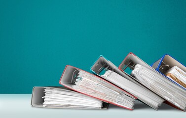 File folders with documents on office desk