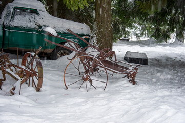 Old Farm equipment in the Snow
