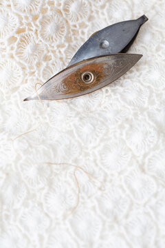 Old Tatting Shuttles on White Tatting
