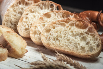 Various rustic bread on a wooden board. Healthy food and farming concept