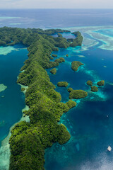 Aerial shot of tidal channel, coral reef and islands in Palau, Micronesia