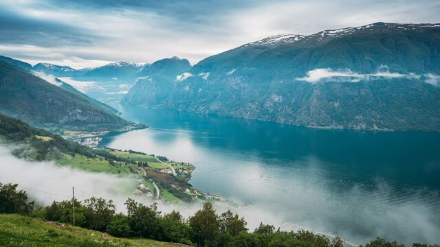 Sogn And Fjordane Fjord, Norway. Amazing Fjord Sogn Og Fjordane. In Fog Clouds. Summer Scenic View Of Famous Natural Attraction Landmark And Popular Destination In Summer 4K. Misty Weather