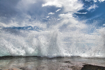 Impressive fury of a crashing big wave.