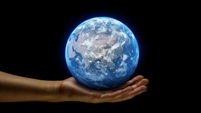 Hand holding a realistic earth planet. Ruling power concept using earth on hands. World globe spinning from asia to europe.