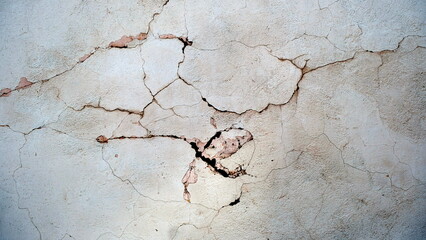 Crack on the concrete surface. Abstract background for design.
