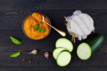 Squash zucchini paste or caviar of vegetables in a glass jar. Healthy vegan food.  