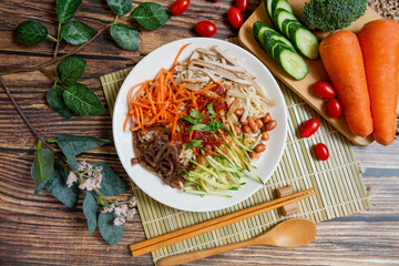 Yunnan-Style Cold Noodles, (cold noodles and vegetables in a sweet, sour, and savory sauce.)